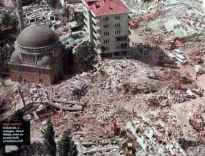 A mosque still stands amidst the rubble of collapsed buildings in this aerial view of a neighborhood in the western Turkish town of Golcuk, 60 miles east of Istanbul, August 19, 1999.